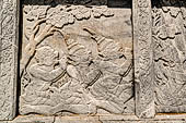 Bangkok Wat Pho. Around the base of the ubosot are 152 stone panels with bas-reliefs which narrate the story of the Ramakien, Thai version of the Hindu Ramayama.  